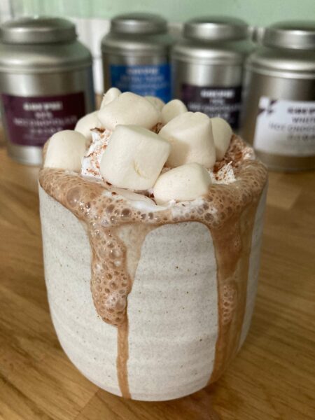 vegan hot chocolate with marshmallows and whipped cream
