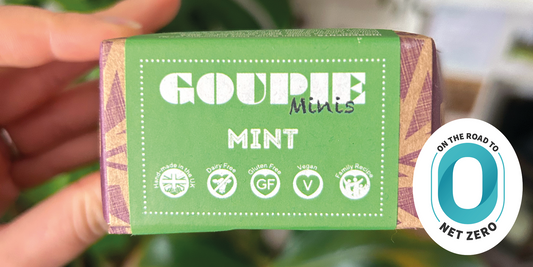 A side view of Mint Goupie Mini box with a Net Zero Now sticker in the bottom right.