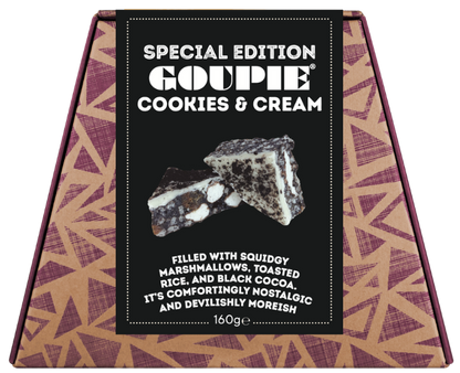 A box of limited edition cookies and cream Goupie, featuring a tan and purple geometric patterned box with a black central label showing a two pieces of cookies and cream goupie.